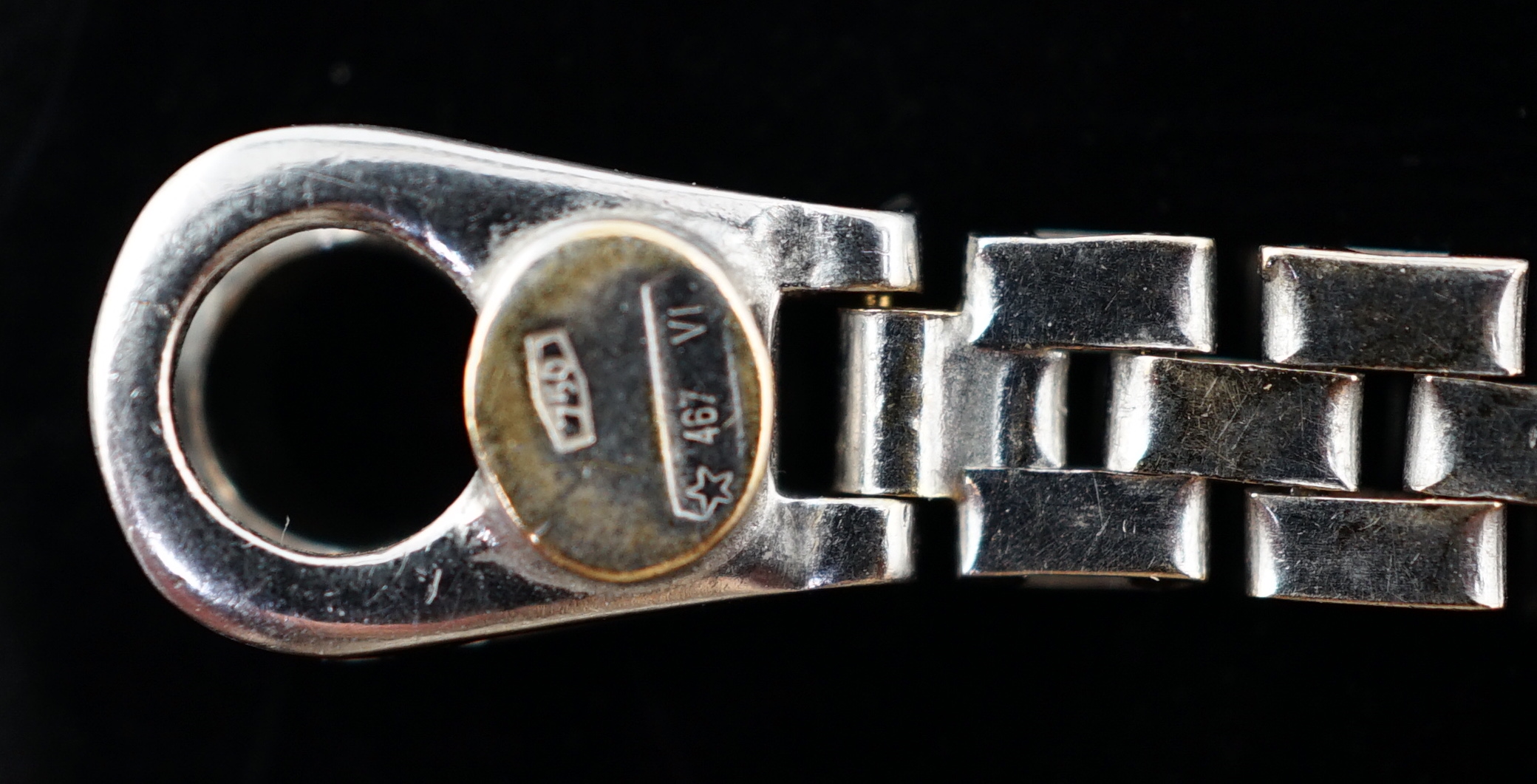 A modern Italian 18k white gold triple row link necklace